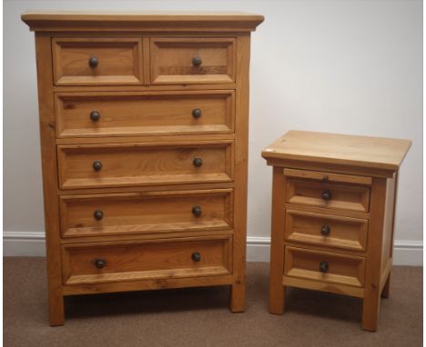 Light oak chest, two short and four long drawers, stile supports (W85cm, H119cm, D43cm) and matching bedside chest, one slide