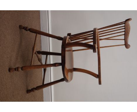 Early 20th century beech stick back armchair, shaped cresting rail, turned supports and stretchers Condition Report Click her