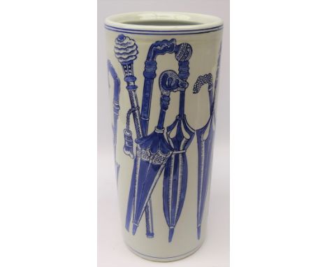 Ceramic blue and white umbrella stand, the body decorated with images of walking sticks and umbrellas, H44.5cm Condition Repo