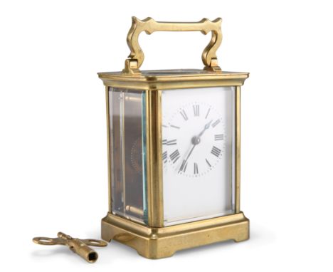 A FRENCH BRASS CASED CARRIAGE CLOCK, by Duverdrey & Bloquel, the white enamel dial with Roman numerals, with key. 10.5cm high