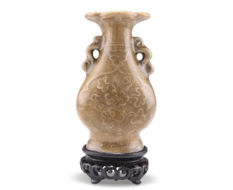 A SUNG TWO-HANDLED VASE, of flask form with ruyi handles, moulded with flowers, on a wooden stand. 14cm high overall