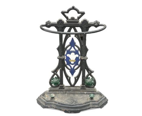 A VICTORIAN CAST IRON STICK STAND, the back panel decorated with Prince of Wales Feathers. 70.5cm high