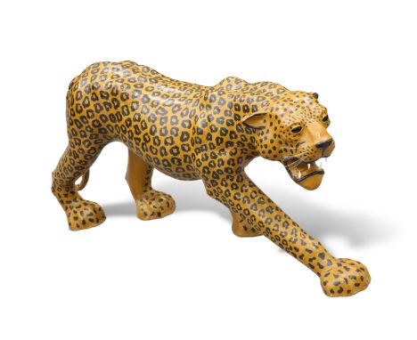 A VERY LARGE VINTAGE PAINTED PAPIER-MÂCHÉ&nbsp;MODEL OF A LEOPARD, modelled in ferocious pose with teeth bared. 70cm high, ap