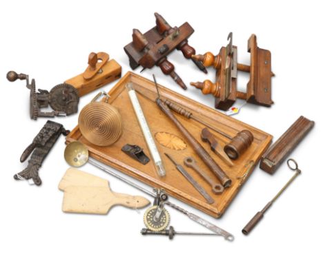 A BOBBIN WINDER,&nbsp;by And. Mattson Mora;&nbsp;A BRASS AND METAL-MOUNTED INSPECTION MIRROR; A FIRE-POLISHED WATER GAUGE TUB