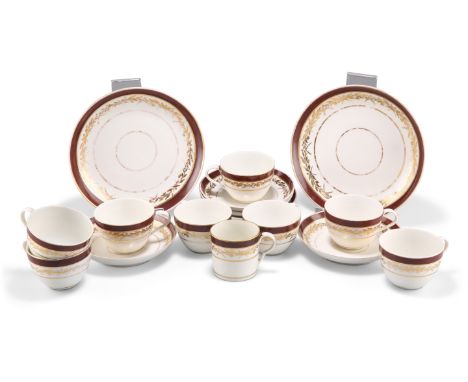A PINXTON PARTIAL TEA SERVICE, comprising two cake plates, eight cups, five saucers and can with ear-shaped handle, decorated