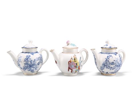 THREE ROYAL WORCESTER MINIATURE TEAPOTS, including two blue and white. (3) 7.5cm highCONDITION REPORTThese are 20th century r