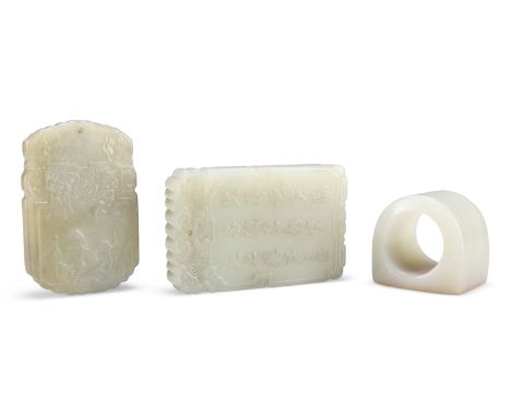 TWO CHINESE JADE PLAQUES, one carved depicting a figure upon an elephant, the other with a tiger and a dragon, both with text