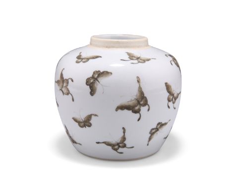 A CHINESE BUTTERFLY JAR, 19TH CENTURY,&nbsp;painted en grisaille with scattered flying butterflies, bears painted seal mark. 