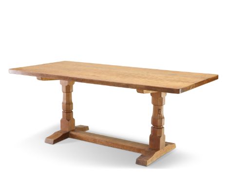 ROBERT THOMPSON OF KILBURN, A MOUSEMAN OAK DINING TABLE, the 6-foot adzed and doweled rectangular top raised on a refectory b