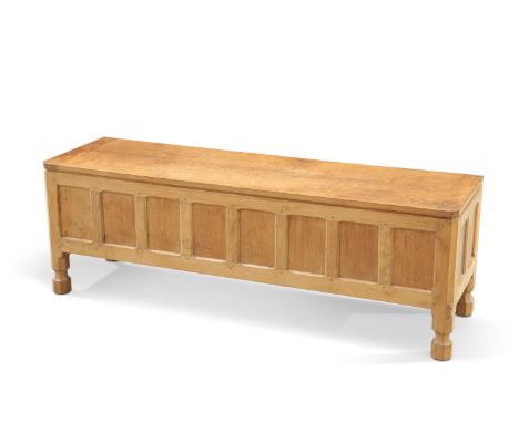 ROBERT THOMPSON OF KILBURN, A MOUSEMAN OAK BLANKET BOX, the 4-foot 6-inch hinged and adzed rectangular top above a panelled c