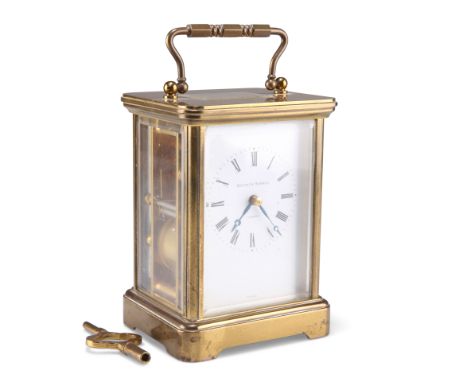 MATTHEW NORMAN, LONDON, A BRASS CASED CARRIAGE CLOCK, the white enamel dial with Roman numerals, signed Matthew Norman, Londo