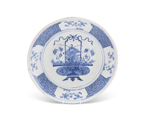 A 19TH CENTURY CHINESE BLUE AND WHITE CHARGER, circular, painted with a basket of flowers. 40.5cm diameterCONDITION REPORTGla
