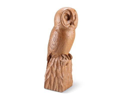 ROBERT THOMPSON OF KILBURN, A MOUSEMAN OAK OWL,&nbsp;carved as an owl standing on a naturalistic rocky base, holding a mouse 