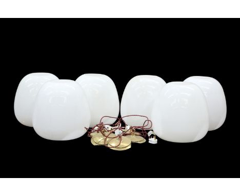 A SET OF SIX 20TH CENTURY OPALINE GLASS LIGHT PENDANTS, each tulip-shaped. (6) 35cm high