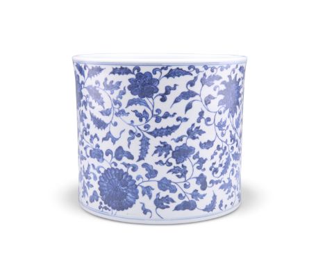 A CHINESE BLUE AND WHITE BRUSHPOT, cylindrical, painted with lotus flowers and scrolling tendrils. 16cm highCONDITION REPORTH