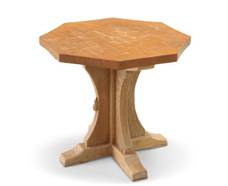 ROBERT THOMPSON OF KILBURN, A MOUSEMAN OAK COFFEE TABLE, the adzed octagonal top raised on a cruciform base, with carved mous