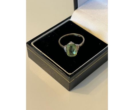 Vintage 9ct gold ring set with green pale gem stone . Size M 2.27 grams . 