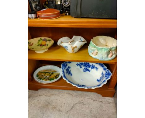2 shelves of porcelain wares includes sylvac planter etc . 