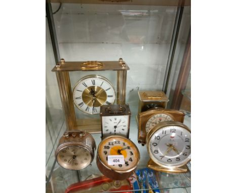 Shelf of clocks . 