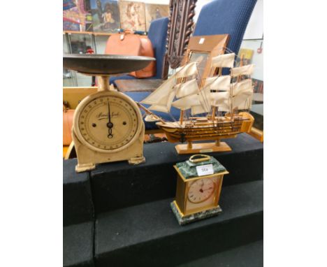 Vintage scales , victory boat model together with clock . 