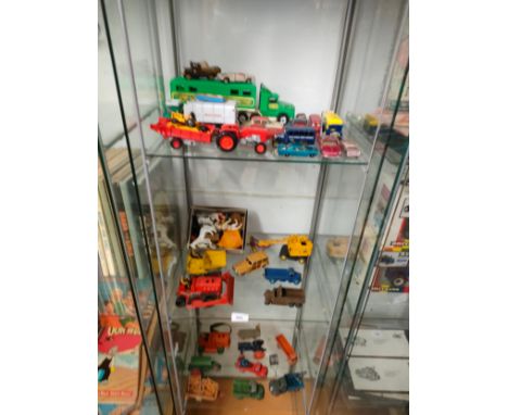 3 Shelf of playworn dinky vehicles , farm animals etc . 