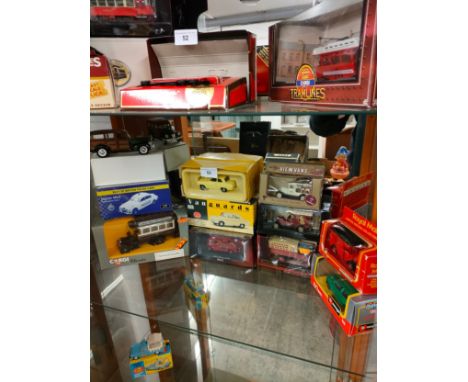 Shelf of models includes vanguard models etc . 