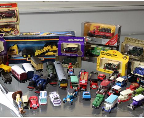 A large quantity of modern die cast automobile models to include Models of Yesteryear, Corgi, Matchbox etc