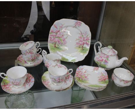 A 1940's Royal Albert Blossom Time tea set - bone china T pot, milk and sugar, 4 cup, 6 saucers, 6 side plates, 1 large plate