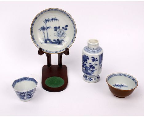 A Chinese porcelain small footed dish, 'Nan King' Cargo (1752) painted in under glaze blue together with a small bowl from th