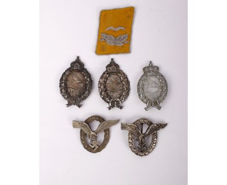 A collection of replica World War II Luftwaffe badges (5), together with a replica collar patch. 