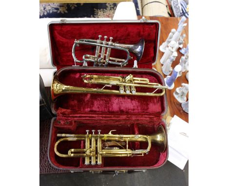Two trumpets, together with a Bugle.