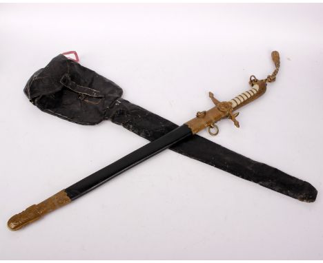 An Officers naval dress sword of the late Rear Admiral Godfrey Place VC. Scabbard and wax cover, 60cmPresented on passing out