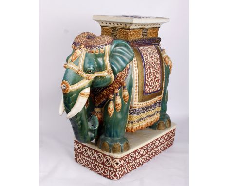 A large South Asian ceramic Elephant seat. 52cm(h)