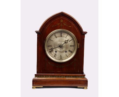 A late 19th century mahogany bracket clock by Pearce &amp; Sons Ltd, Leeds, with black roman numerals on a signed brass dial 