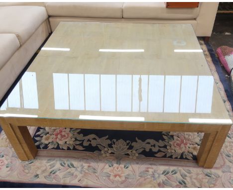 A faux snakeskin coffee table in light tan,120cm x 120cm x 41cm(H).