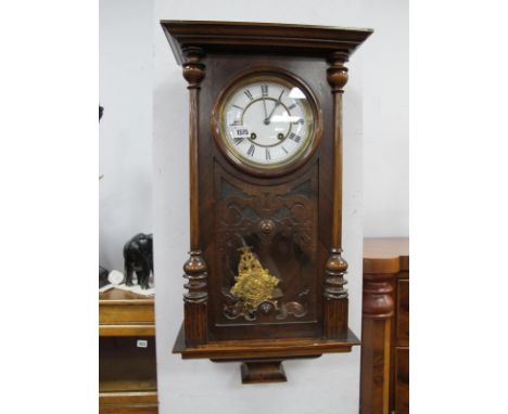 Early XX Century Walnut cased Viennese Style Wall Clock, with eight day movement, black Roman numerals to white enamel dial, 