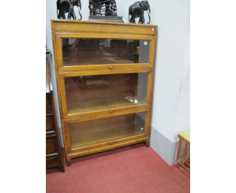 Gunn, Oak Three Sectional Bookcase in the Globe Wernicke Manner, with glazed doors on low base.