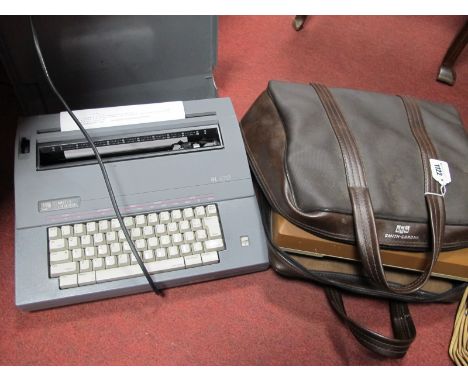 Smith Corona SL470 and Electric Automatic Typewriter, in tan, carry case. (2)
