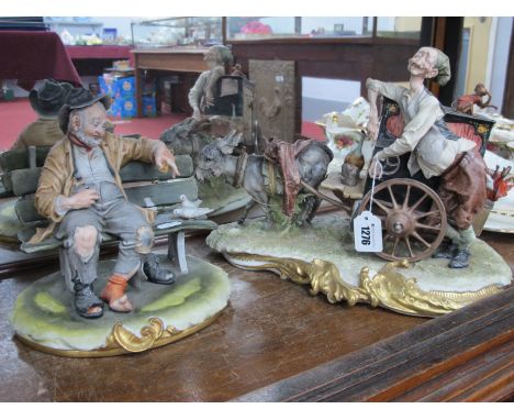 Capodimonte 'The Organ Grinder' Musical Figure Group by D. Bellaire, 35cm wide (chips) and Bruno Merli Tramp figure (chips). 