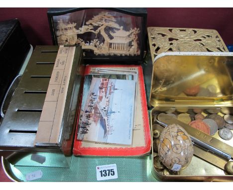 A Polished Stone Egg with Fossils, Japanese Cork Diorama, postcards, brass trivet, 1950's propelling pencil by Langley, RAF b