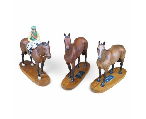 Three Beswick horses to include Lester Piggott on Nijinsky, Red Rum and Arkle, 32cm. Condition - good