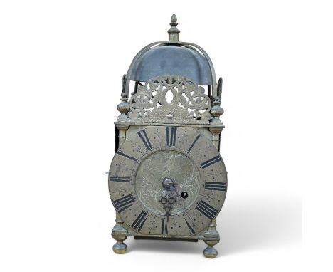 An 18th century lantern clock with verge escapement, 34cm tall. Condition - fair