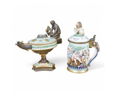 A Richard Ginori, Doccia porcelain tankard and a hand painted porcelain oil lamp, largest 27cm wide. Condition - fair/good