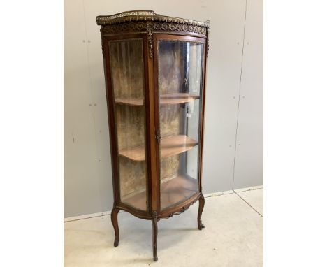 A French gilt metal mounted mahogany marble top vitrine, width 68cm, depth 32cm, height 142cm. Condition - fair