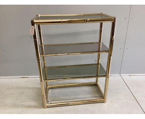 A Contemporary faux bamboo gilt metal four tier open shelf unit, width 76cm, depth 39cm, height 100cm. Condition - fair, one 