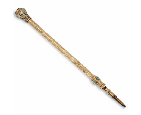 An unmarked yellow metal propelling pencil, with engine turned decoration, accented with small turquoise cabochons and set to
