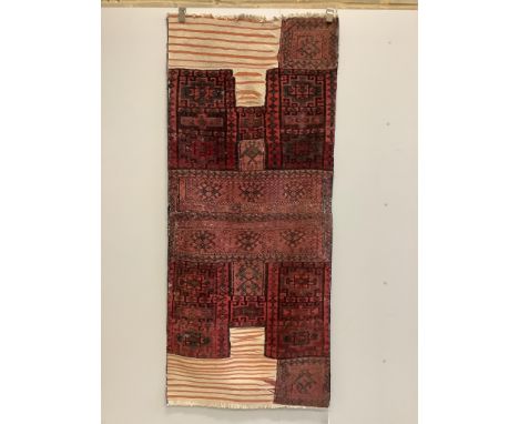 A saddlebag sampler carpet, 222 x 92cm. Condition - fair