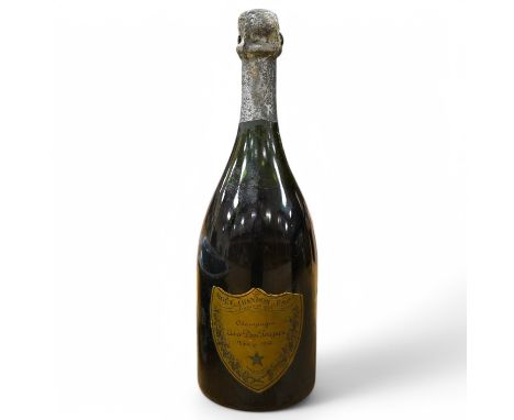 A bottle of Dom Perignon 1964 vintage Champagne in a 1988 box. Condition - good, storage unknown