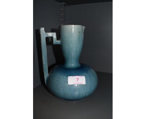 A early art deco design vase possibly attributed in style to Keith Murray with a blue glaze (AF) and thin ceramic body