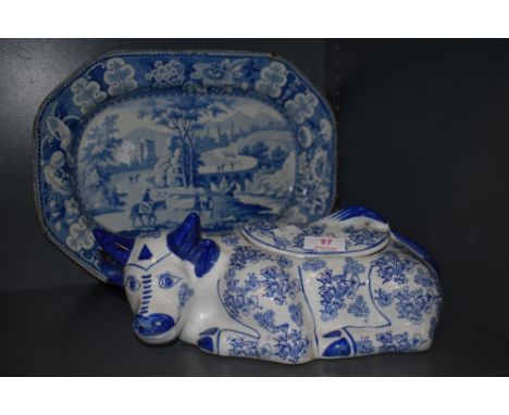 A blue and white ware ceramic charger and similar lidded cow dish